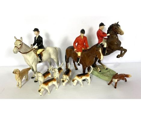 A group of hunting related Beswisk figures, including a jumping foxhunter (868); huntsman; lady on a grey horse; five assorte