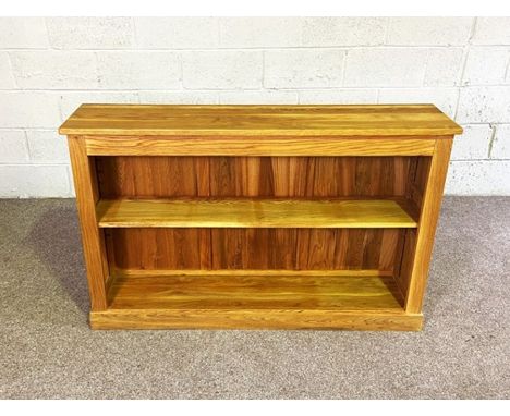 A modern hardwood open bookcase, with single adjustable shelf, 88cm high, 137cm wide; together with a matching pair of square