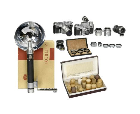 Contax-ZubehörZeiss Ikon, Dresden und Stuttgart. 1) (Ost)Biogon 2,8/3,5 cm Nr. 2471073, an Rücklinse mittig minimale Putzspur