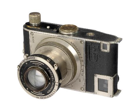 Roland, 2. ModellPlasmat GmbH, Berlin. Roland Nr. W 330, für 4,5 x 6 cm, vernickelte Frontplatte, Trageösen, mit "Kleinbild-P