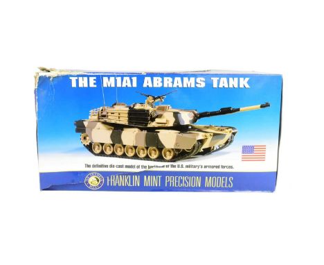 Franklin Mint - an original Franklin Mint made 1/24 scale boxed diecast model M1A1 Abrams Tank. Highly detailed model with wo