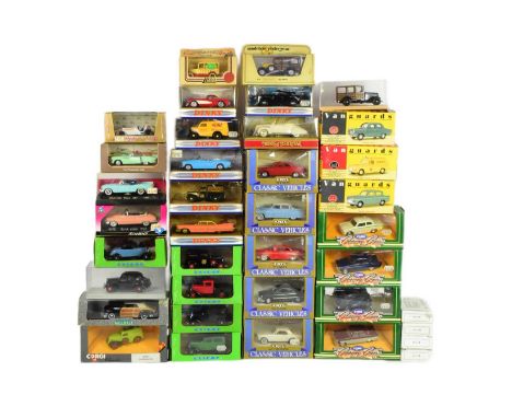 Diecast - a collection of assorted boxed diecast model cars of various scales and makers to include; Matchbox Dinky, ERTL, El