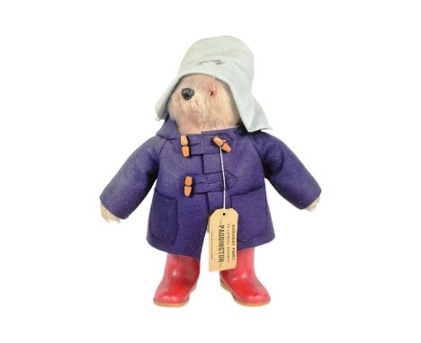 Paddington Bear - a vintage Gabrielle Designs Paddington Bear soft toy teddy bear with blue duffle coat, original tag and red