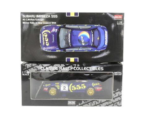 Diecast - a boxed Sun Star made 1/18 scale diecast model of a Subaru Imprezza 555 #2 C.McRae / D. Ringer winner Rally of New 