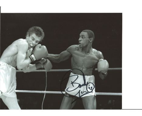 Boxing Herol Bomber Graham 10x8 Signed B/W Photo Pictured In Action During One Of His Fights. Good Condition. All autographs 