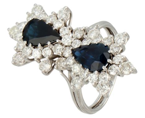 14K White gold Toi &amp; Moi ring with synthetic sapphire and diamond. Set with two pear cut synthetic sapphires (approx. 10.