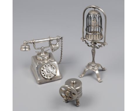 3-piece lot of miniatures silver (1 silver plated). Consisting of a birdcage, retro telephone and a wheel washer, the wheel w