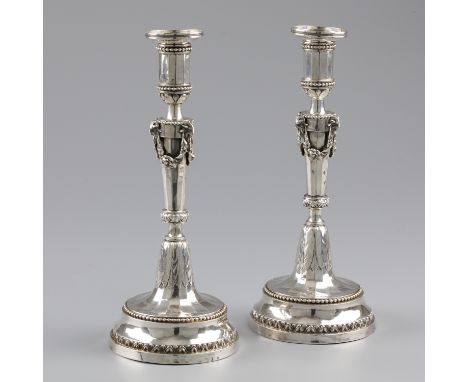 Neoclassical candlesticks (2), van Poucke, Bruges 1792, silver. A two-piece set candlesticks made in Neoclassical Empire silv