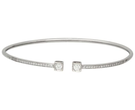 Dinh Van 18K white gold 'Le Cube' bangle bracelet set with approx. 0.35 ct. diamond. Set with 40 brilliant cut diamonds of ap