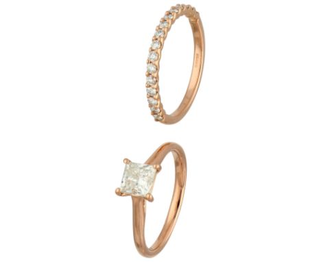 GIA certified 18K rose gold diamond set engagement ring and wedding band. The engagement ring is set with a princess cut GIA 