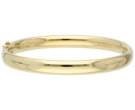 14K Yellow gold smooth bangle bracelet. With safety clip. In good condition. Hallmarks: Dutch assay mark 585 in oak leaf (fro