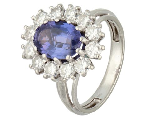 18K White gold entourage ring set with approx. 2.49 ct. natural sapphire and approx. 1.45 ct. diamond. Set with an oval facet