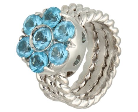 Pasquale Bruni 18K white gold ring with free moving flower set with approx. 3.50 ct. blue topaz. The topaz flower sits like a