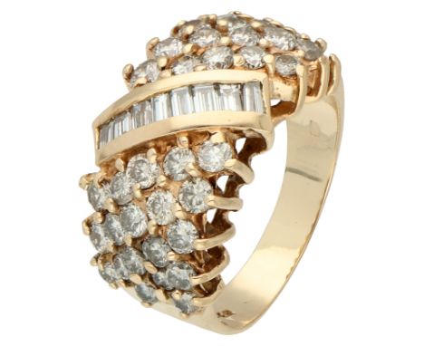 14K yellow gold vintage ring set with approx. 1.66 ct. baguette and brilliant cut diamonds. Set with eight baguette cut diamo