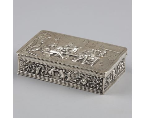 Tobacco box silver. Rectangular model with molded representations in relief including a tavern / inn scene. The Netherlands, 