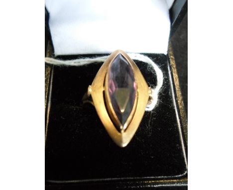 A European single stone marquise shaped amethyst ring