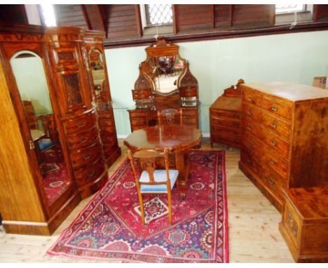 An eight piece matched bedroom suite, some pieces stamped Maple & Company, all of walnut, to include dressing table, bureau, 