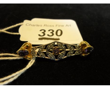An amethyst and diamond cluster bar 9ct gold brooch