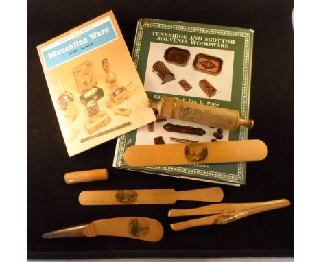 Six items of Mauchlineware to include a large whistle, page turners, glove stretchers and other items, together with a Shire 