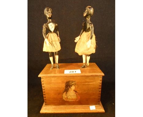 A late 19th century automaton, 'Hubbell's Grand Jubilee Dancers', featuring a pair of black female dancers on bespoke mahogan