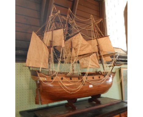 A hand-built scale model of HMS Pandora, a 3-mast gun ship circa 1790, on conforming wooden stand, 110cm long, 110cm tall (to