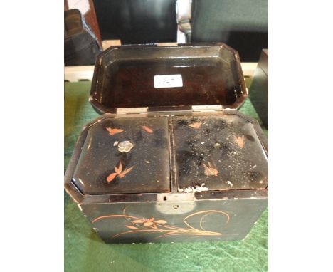 A 19th century Japanese lacquered tea caddy, having twin internal compartments and decorated throughout with mother of pearl 