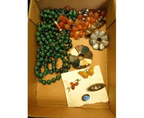 A Scottish agate necklace with white metal mounts, together with two specimen brooches, a hardstone seal, an early 20th centu