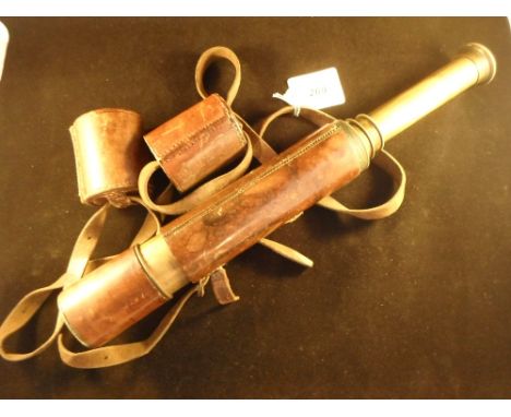 A 20th century stitched leather cased three-drawer telescope: L Casella, London, bearing the government broad arrow mark, of 