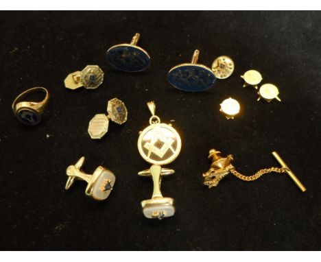 A 9ct gold and enamel Masonic swivel ring, together with a collection of Masonic cufflinks, tie studs and other items