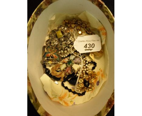 A quantity of costume jewellery to include an enamel butterfly brooch, an Edwardian pierced brooch with yellow central stone,