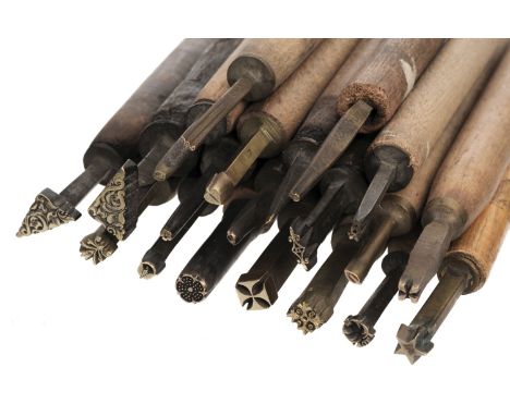 * Decorative finishing tools. 20 brass decorative finishing tools, including centre and corner tools, makers include Timbury,