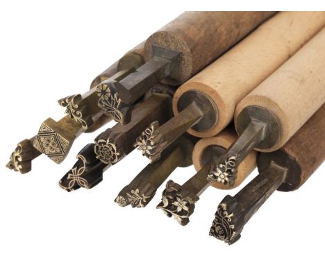 * Decorative finishing tools. 20 brass decorative finishing tools, including centre and corner tools, makers include Morris &