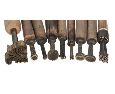 * Decorative finishing tools. 23 brass decorative finishing tools, including centre and corner tools, makers include Brook, H