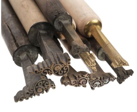 * Finishing tools. A collection of 23 decorative finishing tools, comprising eight decorative corner finishing tools (4 pairs