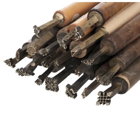 * Decorative finishing tools. 20 brass decorative finishing tools, including centre and corner tools, makers include Paas, Ro