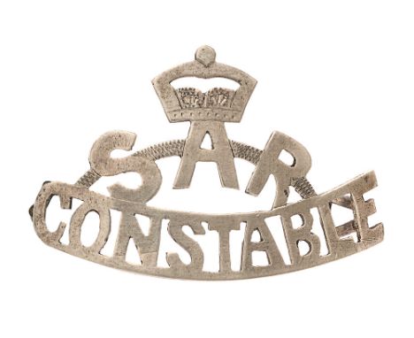 South Australia Railway Police Constable's head-dress badge.  Good rare early die-cast sheet white metal example. Crowned arc