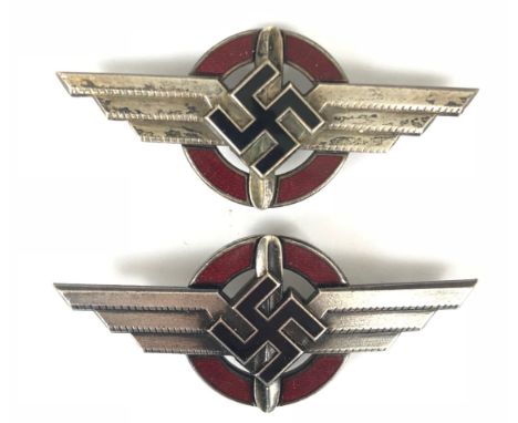 2 x German Third Reich DLV cap badges by Berg &amp; Nolte, LÃ¼denscheid.  Good scarce examples. Each set on a red enamel ring