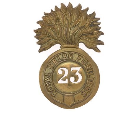 23rd (Royal Welsh Fusiliers) glengarry badge c. 1874-81.  Good scarce die-stamped brass flaming grenade, the ball bearing str