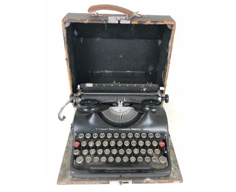 German Third Reich WW2 typewriter with SS key.  A scarce example as used in SS Offices and headquarters. The â€œ3â€ key with 