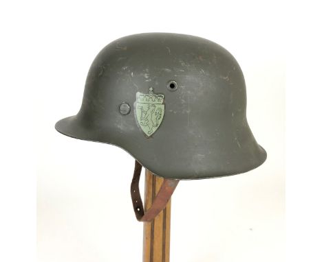 Norwegian Army (WW2 German) Steel Helmet.  A very good example of the WW2 German raw edge helmet taken into service by the No