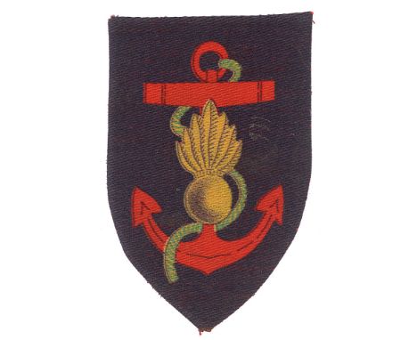 Royal Marine Engineers printed cloth formation sign badge.  Good scarce yellow grenade on red fouled anchor all on a blue shi