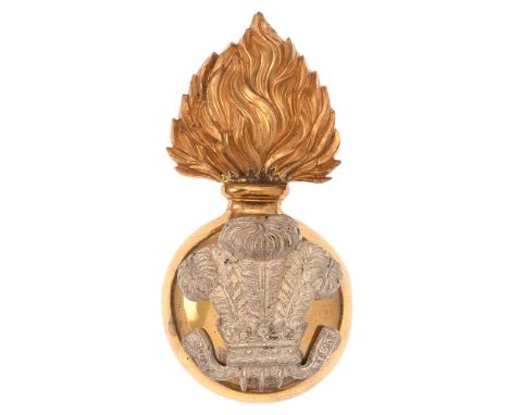 Royal Welsh Fusiliers post 1881 Officer's foreign service helmet badge.  Good rare gilt flaming grenade, the domed ball mount