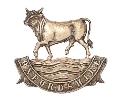 Oxfordshire Militia Victorian glengarry badge c. 1874-81.  Good scarce die-stamped white metal Ox crossing a ford resting on 