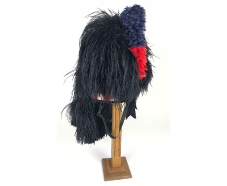 Scots Guards Piper's Feather Bonnet A good clean example of the black feather bonnet with four side tails. Lower red, white a