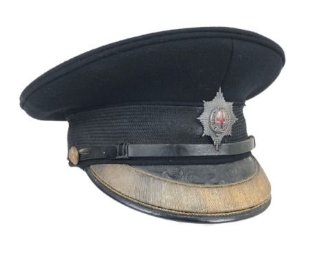 Coldstream Guards Officer's peaked forage cap by Edward Smith London  Dark blue melton cloth body with leather peak decorated