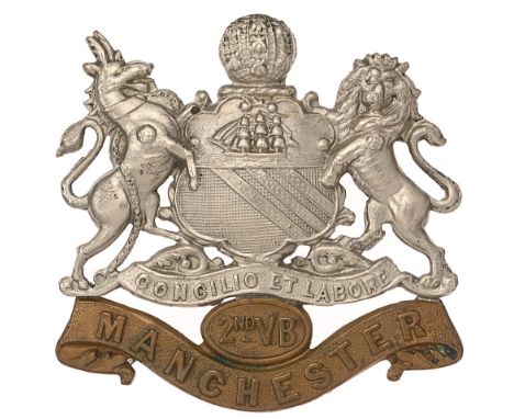 2nd VB Manchester Regiment cap badge c. 1896-1908.   Fine die-stamped white metal City Arms on brass MANCHESTER scroll bearin