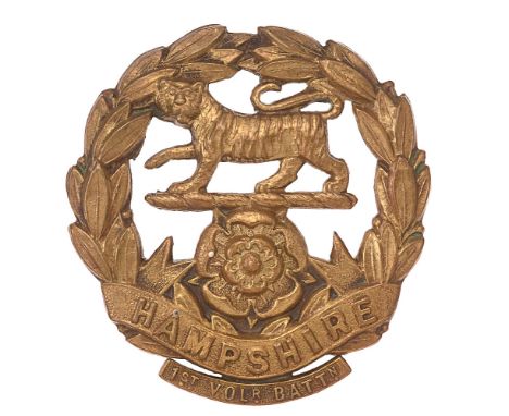 1st (Winchester) VB Hampshire Regiment pre 1908 cap badge.  Good scarce die-stamped bronze Tiger on Rose resting in laurel sp