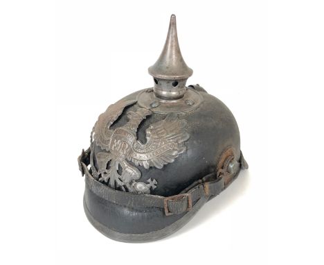 Imperial German Prussian WW1 Pickelhaube.  This example fitted with grey metal fittings. Complete with Prussian helmet plate,