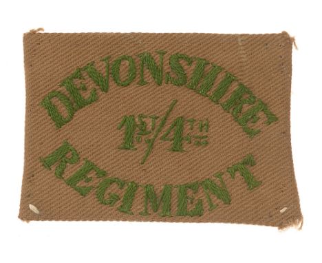 1st/4th Battalion Devonshire Regiment WW1 Foreign Service Helmet cloth pagri badge.  Good scarce KD rectangle embroidered in 