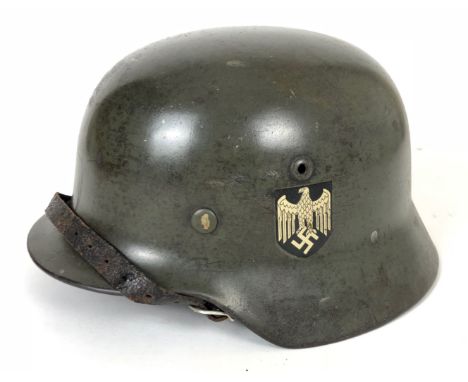 German Third Reich WW2 M40 Army double decal steel helmet.  Good scarce rolled edge example retaining Army eagle and swastika